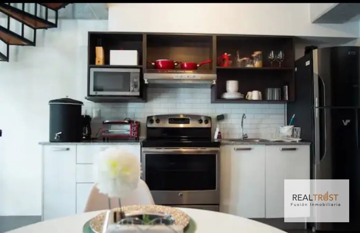APARTAMENTO TIPO LOFT CON JARDÍN AMUEBLADO EN VENTA ZONA 10 - 7