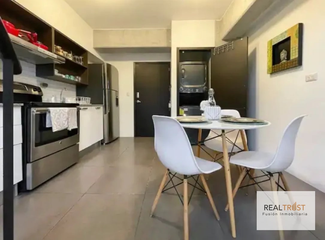 APARTAMENTO TIPO LOFT CON JARDÍN AMUEBLADO EN VENTA ZONA 10 - 6