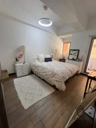 Apto de 1 dormitorio con balcón — Apartamento en Venta en Zona 10, Guatemala, Ciudad — miniatura 5 de 13