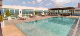 APARTAMENTO EN VENTA ZONA 14  EN EDIFICIO VILLA RISHO — Apartamento en Venta en Zona 16, Guatemala, Ciudad — miniatura 3 de 11